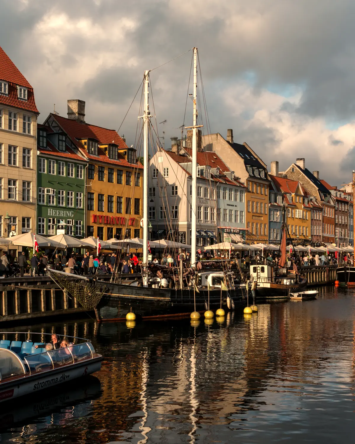 Nyhavn in evening light: the coloured harbour houses and boats, Copenhagen
