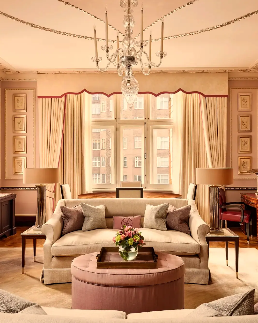Living room of the Sutherland Suite (209), with chandelier and bay window